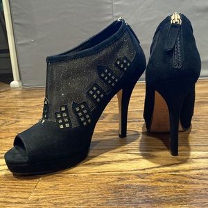 KSNY Suede Peep-Toed Black Ankle “Boot” Heels with Golden Cityscape Design